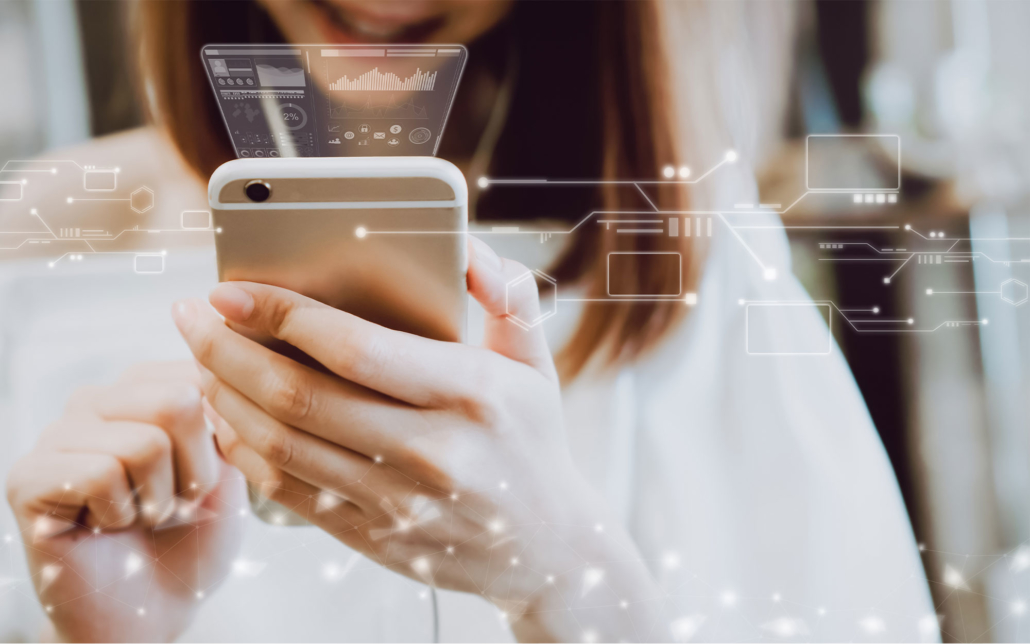 Woman using top trending technology on iphone