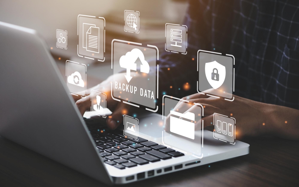 Worker looking through recovery files on computer